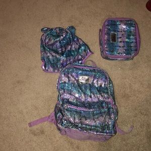 book bag with an attached hat and a lunch box